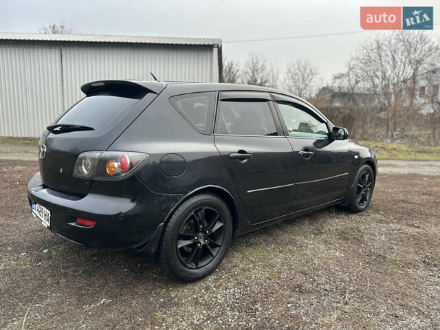 Чорний Мазда 3, об'ємом двигуна 1.6 л та пробігом 272 тис. км за 3999 $, фото 4 на Automoto.ua