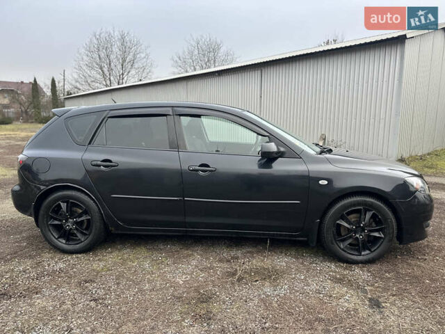 Чорний Мазда 3, об'ємом двигуна 1.6 л та пробігом 272 тис. км за 3999 $, фото 3 на Automoto.ua