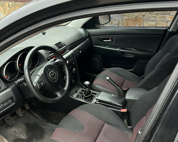 Черный Мазда 3, объемом двигателя 1.6 л и пробегом 260 тыс. км за 3250 $, фото 7 на Automoto.ua