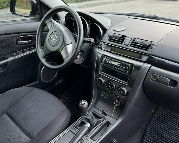 Чорний Мазда 3, об'ємом двигуна 1.6 л та пробігом 230 тис. км за 4500 $, фото 11 на Automoto.ua