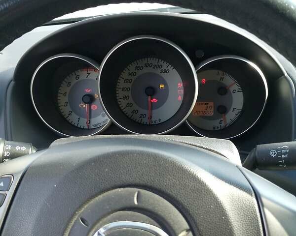 Чорний Мазда 3, об'ємом двигуна 1.6 л та пробігом 207 тис. км за 5200 $, фото 12 на Automoto.ua