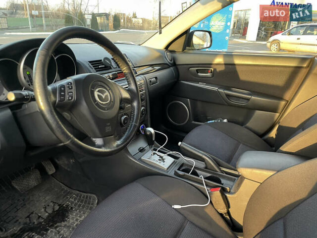 Черный Мазда 3, объемом двигателя 1.6 л и пробегом 360 тыс. км за 4600 $, фото 12 на Automoto.ua