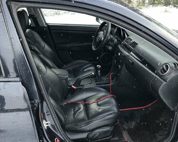 Черный Мазда 3, объемом двигателя 1.6 л и пробегом 296 тыс. км за 4499 $, фото 10 на Automoto.ua