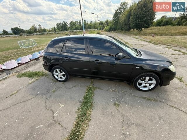 Черный Мазда 3, объемом двигателя 1.6 л и пробегом 289 тыс. км за 3900 $, фото 7 на Automoto.ua