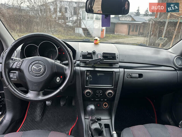 Чорний Мазда 3, об'ємом двигуна 1.6 л та пробігом 272 тис. км за 3999 $, фото 9 на Automoto.ua