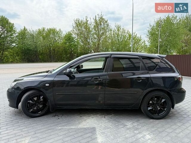 Чорний Мазда 3, об'ємом двигуна 1.6 л та пробігом 283 тис. км за 2999 $, фото 11 на Automoto.ua