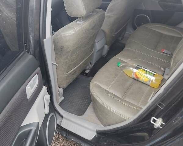 Черный Мазда 3, объемом двигателя 1.6 л и пробегом 285 тыс. км за 4000 $, фото 4 на Automoto.ua