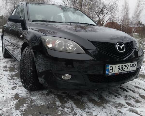 Черный Мазда 3, объемом двигателя 1.6 л и пробегом 134 тыс. км за 5600 $, фото 6 на Automoto.ua