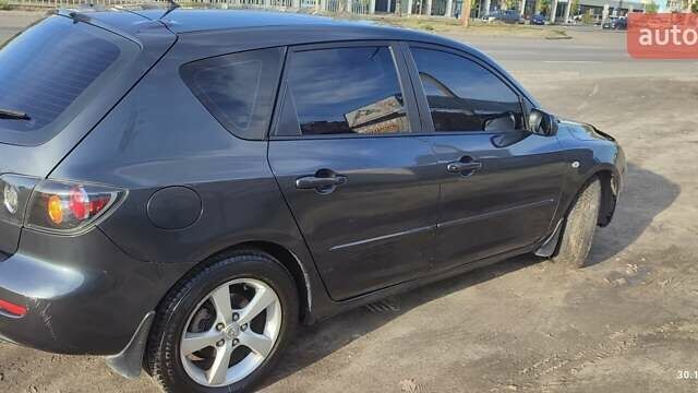 Чорний Мазда 3, об'ємом двигуна 1.6 л та пробігом 316 тис. км за 4300 $, фото 13 на Automoto.ua