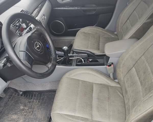 Черный Мазда 3, объемом двигателя 1.6 л и пробегом 285 тыс. км за 4000 $, фото 5 на Automoto.ua