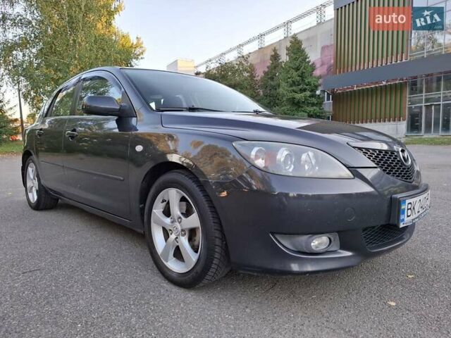 Черный Мазда 3, объемом двигателя 1.6 л и пробегом 193 тыс. км за 4999 $, фото 5 на Automoto.ua