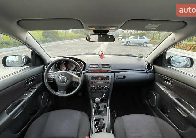 Черный Мазда 3, объемом двигателя 2 л и пробегом 220 тыс. км за 6000 $, фото 19 на Automoto.ua