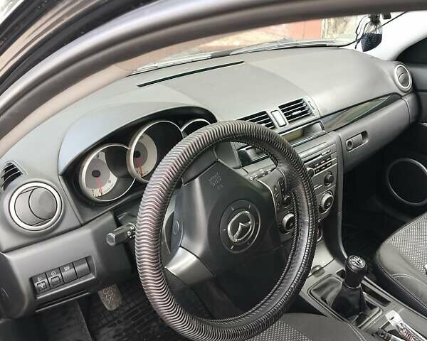Чорний Мазда 3, об'ємом двигуна 1.6 л та пробігом 158 тис. км за 6000 $, фото 3 на Automoto.ua