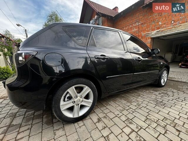 Чорний Мазда 3, об'ємом двигуна 2 л та пробігом 254 тис. км за 4500 $, фото 5 на Automoto.ua
