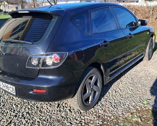 Черный Мазда 3, объемом двигателя 1.56 л и пробегом 233 тыс. км за 5200 $, фото 9 на Automoto.ua