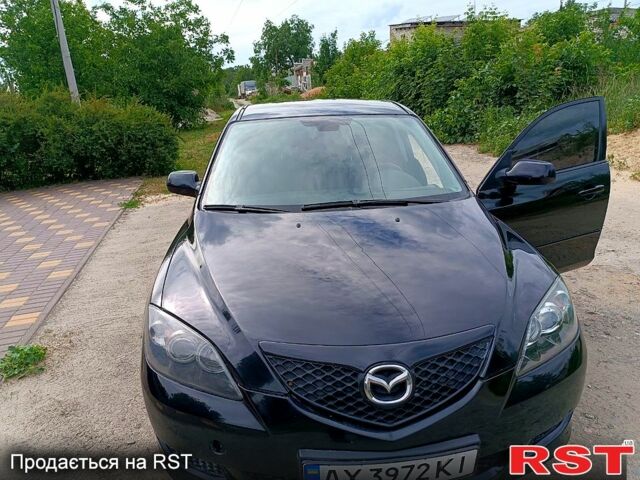 Черный Мазда 3, объемом двигателя 1.6 л и пробегом 155 тыс. км за 5200 $, фото 1 на Automoto.ua