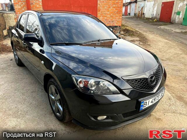 Черный Мазда 3, объемом двигателя 1.6 л и пробегом 333 тыс. км за 4600 $, фото 6 на Automoto.ua