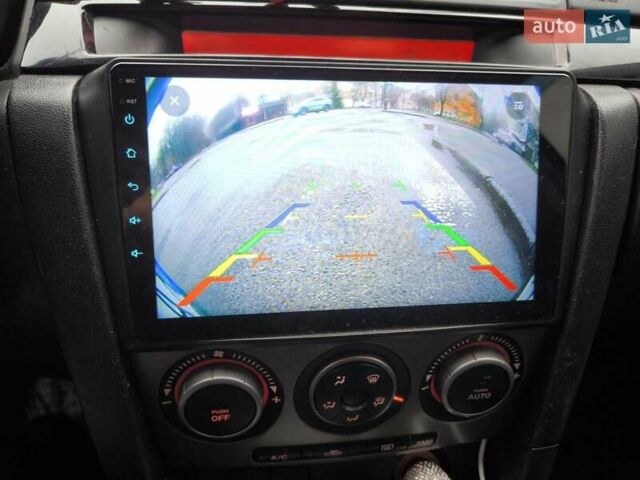 Чорний Мазда 3, об'ємом двигуна 1.6 л та пробігом 228 тис. км за 5555 $, фото 11 на Automoto.ua