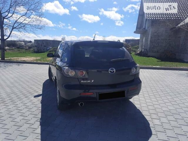Чорний Мазда 3, об'ємом двигуна 2 л та пробігом 222 тис. км за 5700 $, фото 6 на Automoto.ua