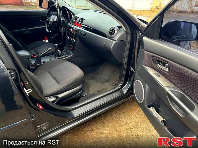 Черный Мазда 3, объемом двигателя 1.6 л и пробегом 333 тыс. км за 4600 $, фото 9 на Automoto.ua