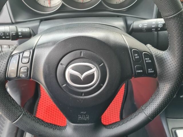 Черный Мазда 3, объемом двигателя 2 л и пробегом 120 тыс. км за 5400 $, фото 4 на Automoto.ua