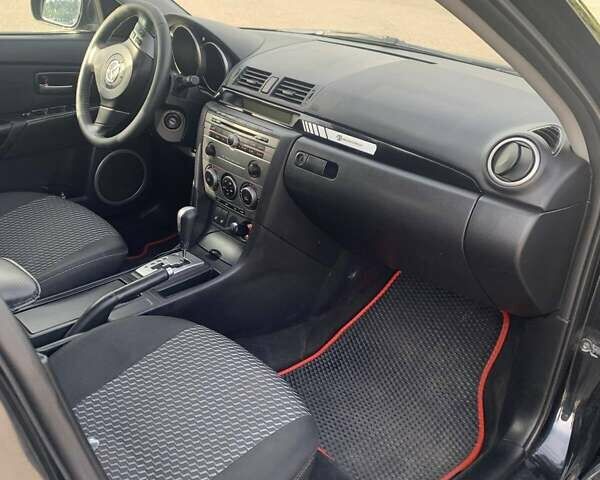 Черный Мазда 3, объемом двигателя 1.6 л и пробегом 247 тыс. км за 5000 $, фото 8 на Automoto.ua