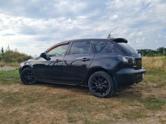 Черный Мазда 3, объемом двигателя 2 л и пробегом 120 тыс. км за 5400 $, фото 1 на Automoto.ua