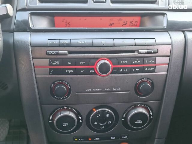 Чорний Мазда 3, об'ємом двигуна 1.6 л та пробігом 187 тис. км за 4990 $, фото 22 на Automoto.ua