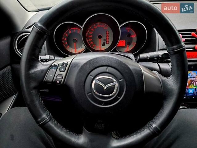 Чорний Мазда 3, об'ємом двигуна 1.6 л та пробігом 228 тис. км за 5555 $, фото 9 на Automoto.ua