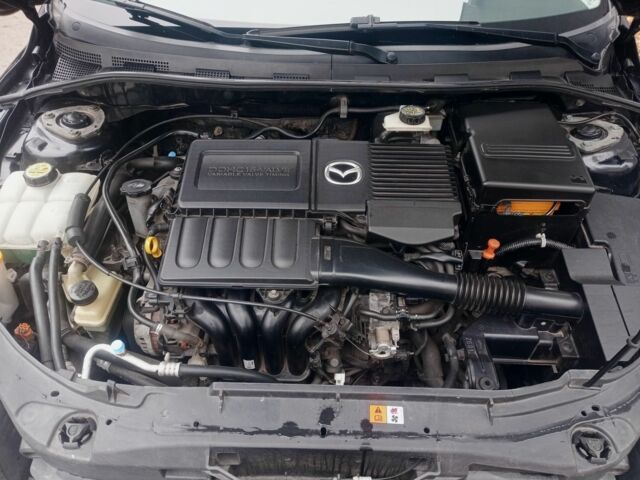 Чорний Мазда 3, об'ємом двигуна 1.6 л та пробігом 165 тис. км за 6100 $, фото 7 на Automoto.ua