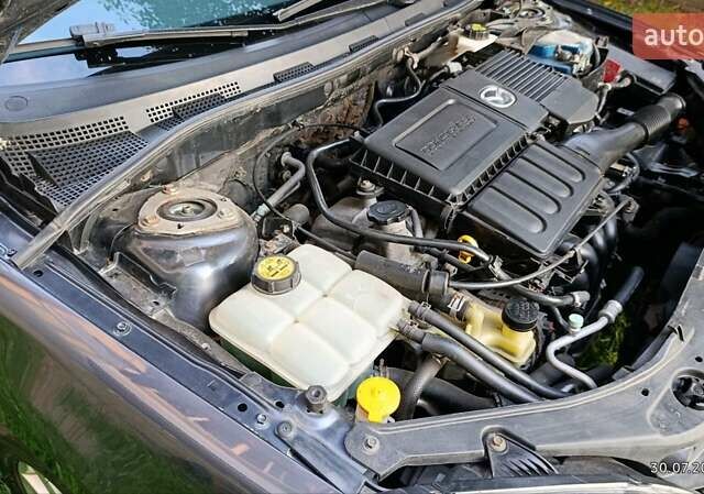 Чорний Мазда 3, об'ємом двигуна 1.6 л та пробігом 205 тис. км за 4999 $, фото 22 на Automoto.ua