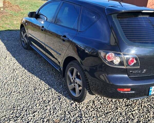 Черный Мазда 3, объемом двигателя 1.56 л и пробегом 233 тыс. км за 5200 $, фото 11 на Automoto.ua