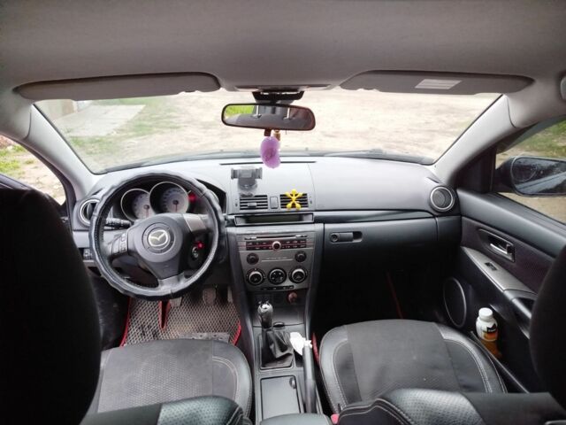 Черный Мазда 3, объемом двигателя 1.6 л и пробегом 246 тыс. км за 5500 $, фото 12 на Automoto.ua