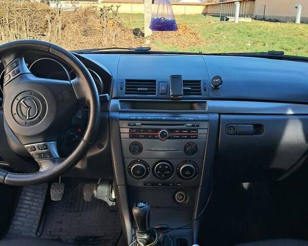 Черный Мазда 3, объемом двигателя 1.56 л и пробегом 233 тыс. км за 5200 $, фото 5 на Automoto.ua