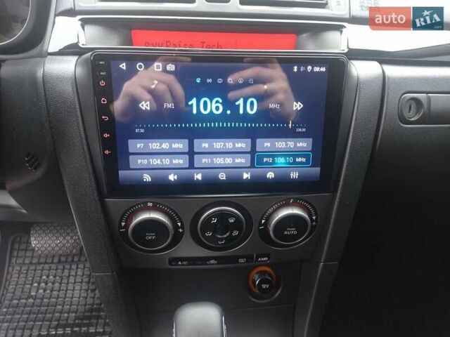 Черный Мазда 3, объемом двигателя 1.6 л и пробегом 165 тыс. км за 6100 $, фото 20 на Automoto.ua