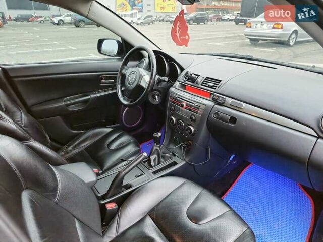 Чорний Мазда 3, об'ємом двигуна 2 л та пробігом 281 тис. км за 6500 $, фото 10 на Automoto.ua
