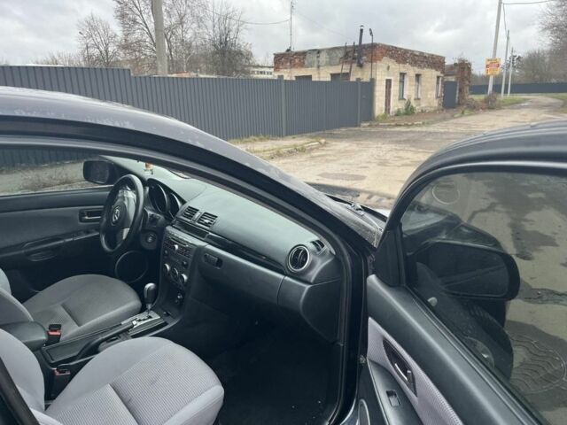 Черный Мазда 3, объемом двигателя 1.6 л и пробегом 212 тыс. км за 5500 $, фото 8 на Automoto.ua