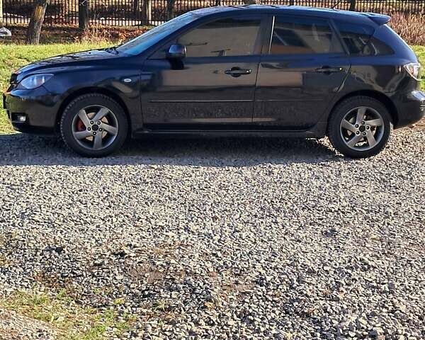 Черный Мазда 3, объемом двигателя 1.56 л и пробегом 233 тыс. км за 5200 $, фото 2 на Automoto.ua