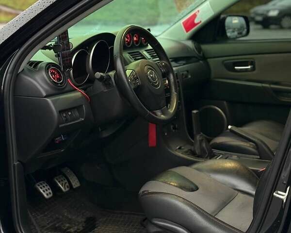 Чорний Мазда 3, об'ємом двигуна 2.26 л та пробігом 140 тис. км за 6700 $, фото 7 на Automoto.ua