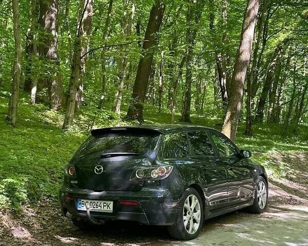 Чорний Мазда 3, об'ємом двигуна 2 л та пробігом 180 тис. км за 5888 $, фото 1 на Automoto.ua