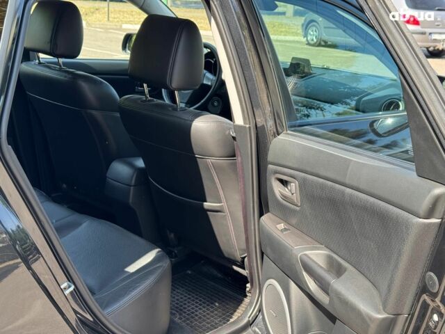 Черный Мазда 3, объемом двигателя 1.6 л и пробегом 131 тыс. км за 5990 $, фото 13 на Automoto.ua