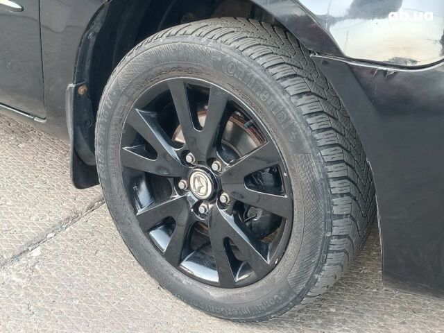 Чорний Мазда 3, об'ємом двигуна 1.6 л та пробігом 187 тис. км за 4990 $, фото 5 на Automoto.ua