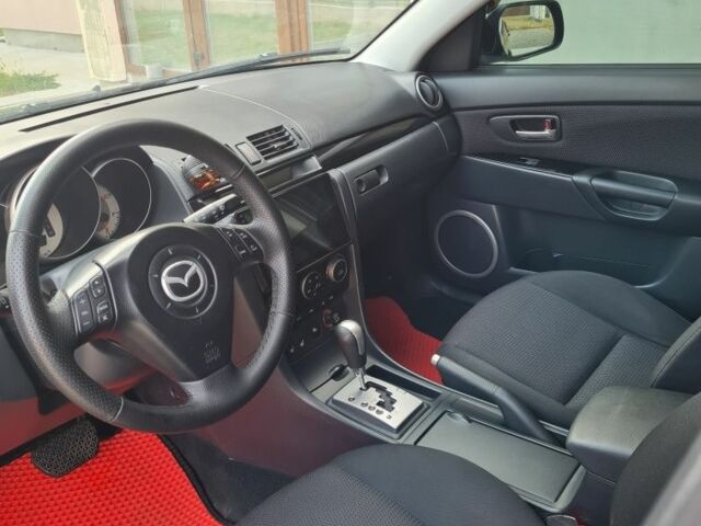 Черный Мазда 3, объемом двигателя 2 л и пробегом 120 тыс. км за 5400 $, фото 3 на Automoto.ua