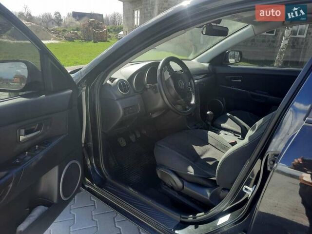 Чорний Мазда 3, об'ємом двигуна 2 л та пробігом 222 тис. км за 5700 $, фото 10 на Automoto.ua