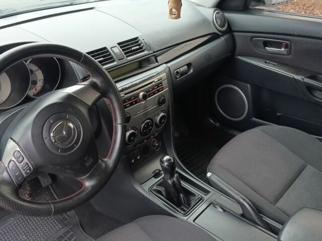 Черный Мазда 3, объемом двигателя 1.6 л и пробегом 256 тыс. км за 4600 $, фото 10 на Automoto.ua