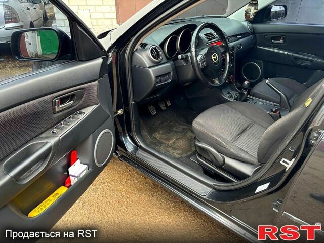 Черный Мазда 3, объемом двигателя 1.6 л и пробегом 333 тыс. км за 4600 $, фото 8 на Automoto.ua