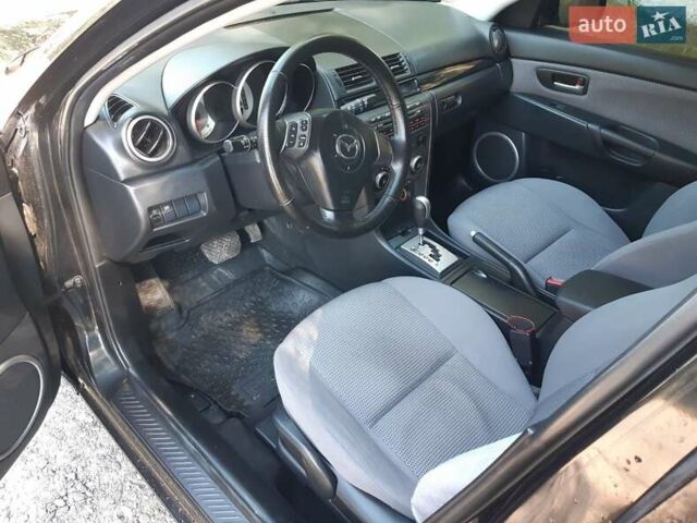 Чорний Мазда 3, об'ємом двигуна 1.6 л та пробігом 365 тис. км за 5900 $, фото 9 на Automoto.ua