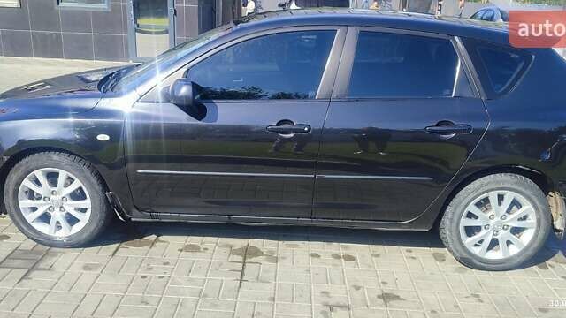Чорний Мазда 3, об'ємом двигуна 1.6 л та пробігом 215 тис. км за 6500 $, фото 13 на Automoto.ua