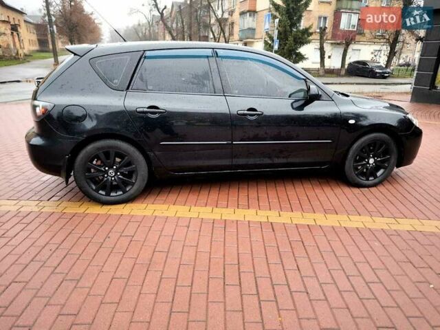Чорний Мазда 3, об'ємом двигуна 1.6 л та пробігом 228 тис. км за 5555 $, фото 8 на Automoto.ua