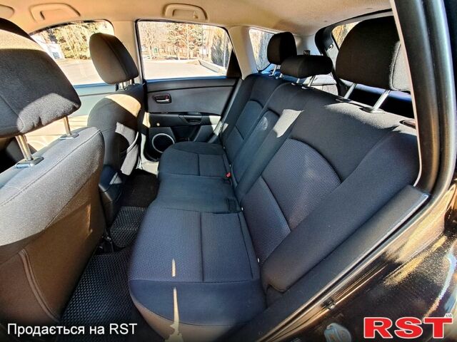 Черный Мазда 3, объемом двигателя 1.6 л и пробегом 176 тыс. км за 5300 $, фото 11 на Automoto.ua